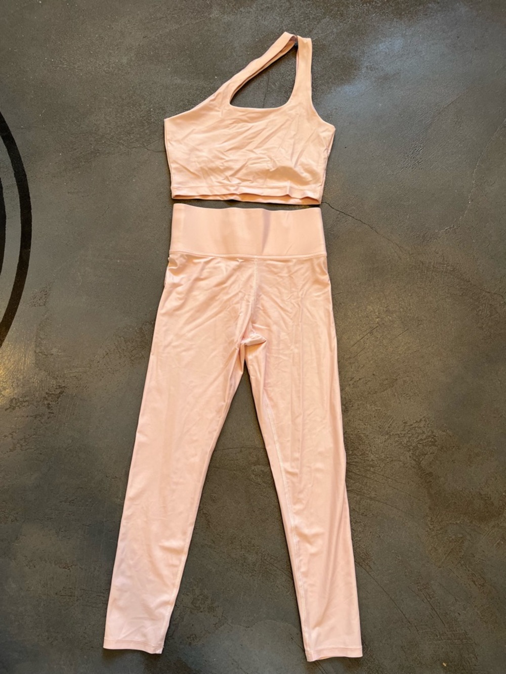 Carbon38 Pink One-Shoulder Sports Bra and leggings